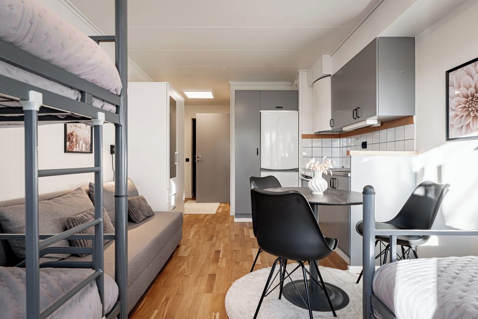 Classic Triple Room, City View | Living area | 32-inch LCD TV with cable channels