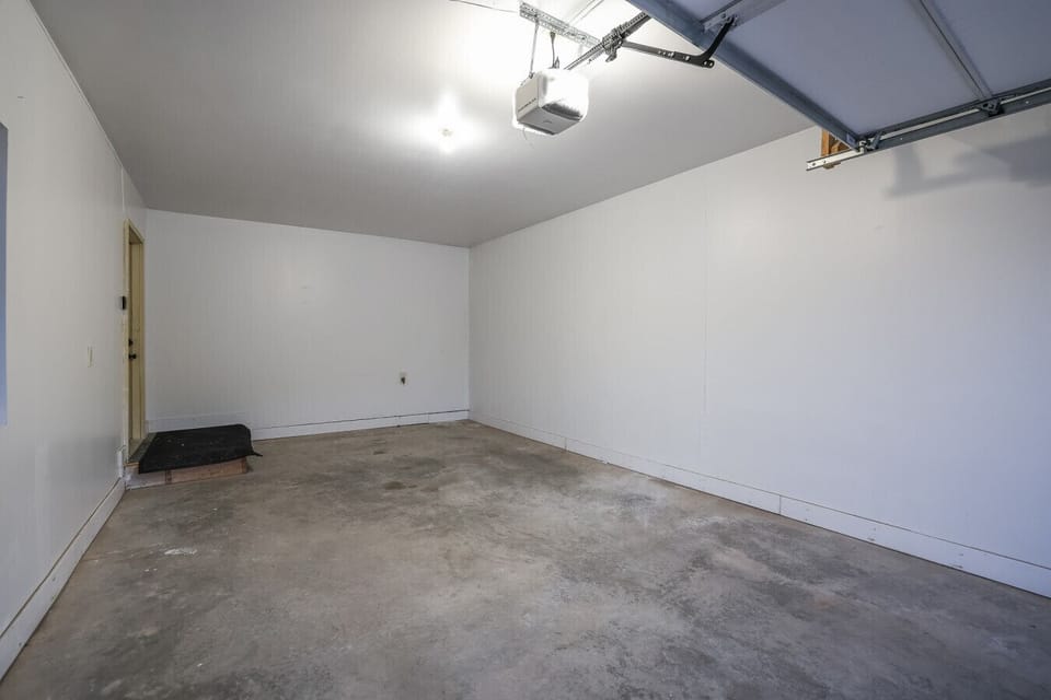 Enjoy the convenience of your own private garage with covered parking, keeping your car secure and protected!