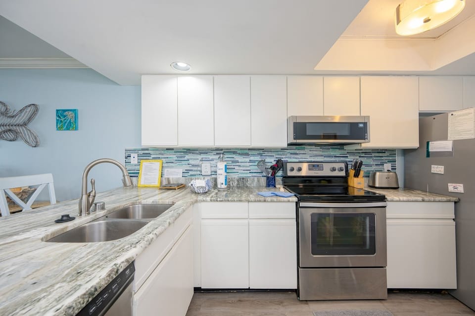 Condo, 2 Bedrooms | Private kitchen | Coffee/tea maker, fridge, oven