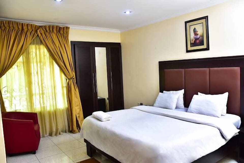 Economy Room, Balcony, City View | Desk, laptop workspace, blackout drapes, soundproofing