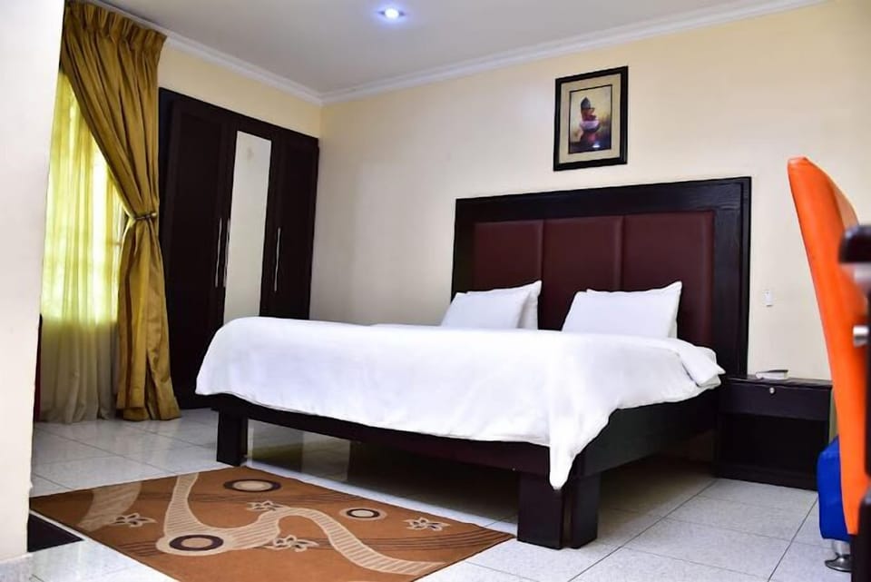 Economy Room, Balcony, City View | Desk, laptop workspace, blackout drapes, soundproofing