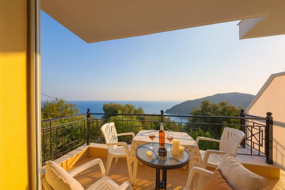 Balcony with Breathtaking Sunset and Sea Views
Watch the sky light up each evening from your private outdoor dining area.