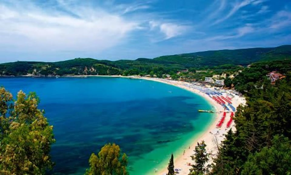 Valtos Beach – Sandy Shoreline and Turquoise Waters Framed by Hills (5 km)

