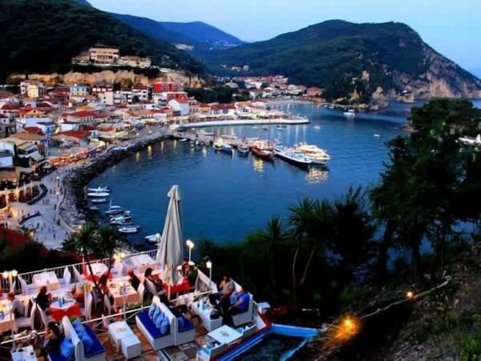 Discover the Charm of Parga from Above
Capture the essence of this coastal town with views of the harbor, hills, and colorful homes.