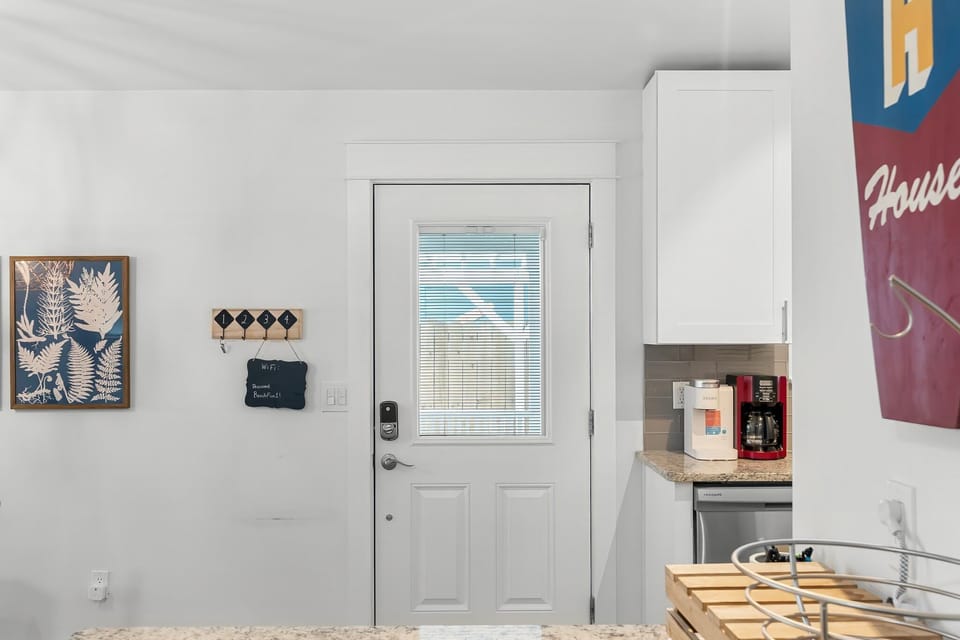 Entry door with a window that lets in natural light