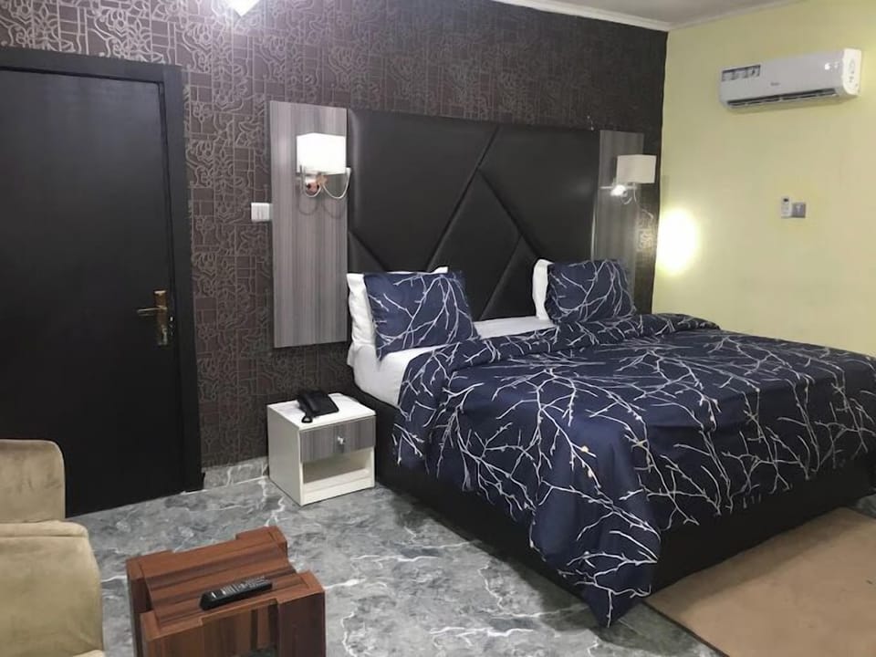 Family Room, Balcony, City View | Desk, laptop workspace, soundproofing, free WiFi