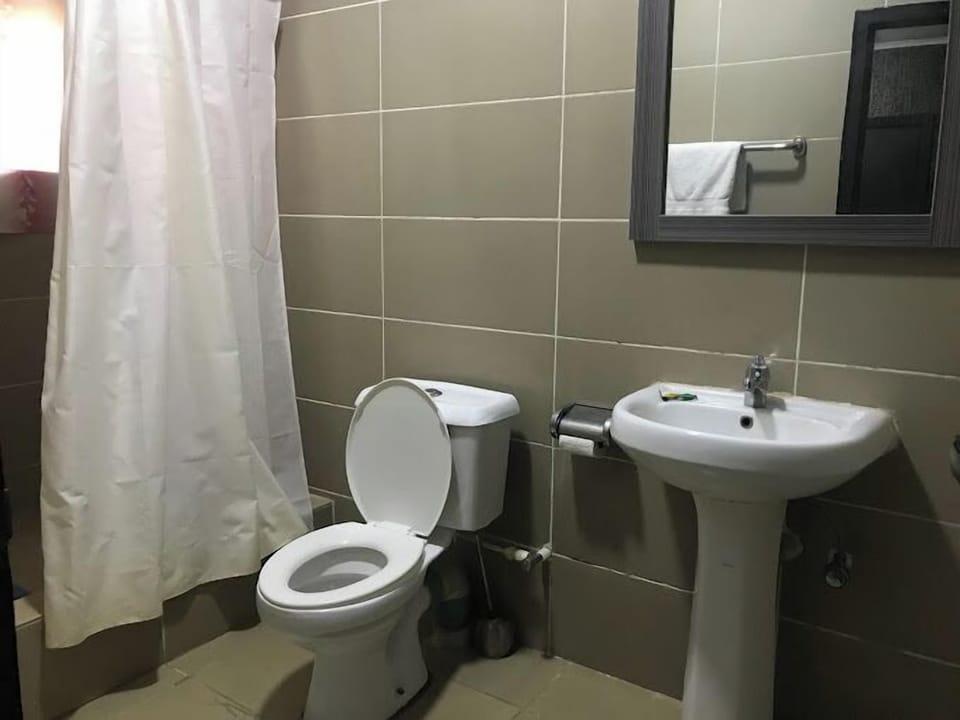 Family Room, Balcony, City View | Bathroom | Free toiletries, hair dryer, towels, soap