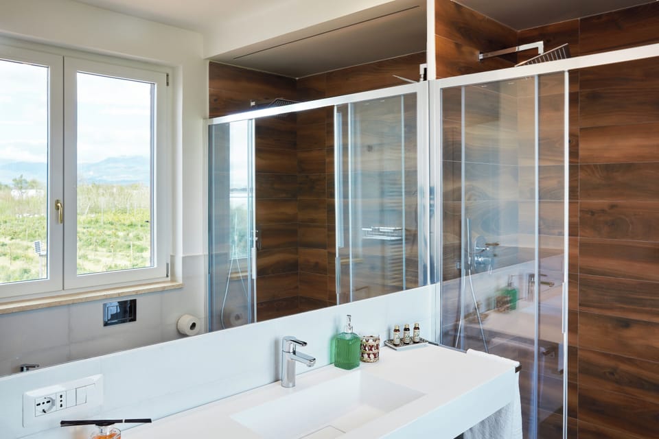 Triple Room, Garden View | Bathroom | Free toiletries, hair dryer, bathrobes, bidet