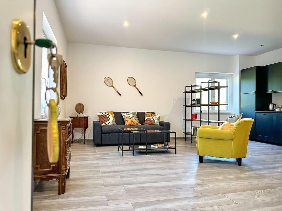 Apartment, Courtyard View | Living area | 60-inch Smart TV with digital channels