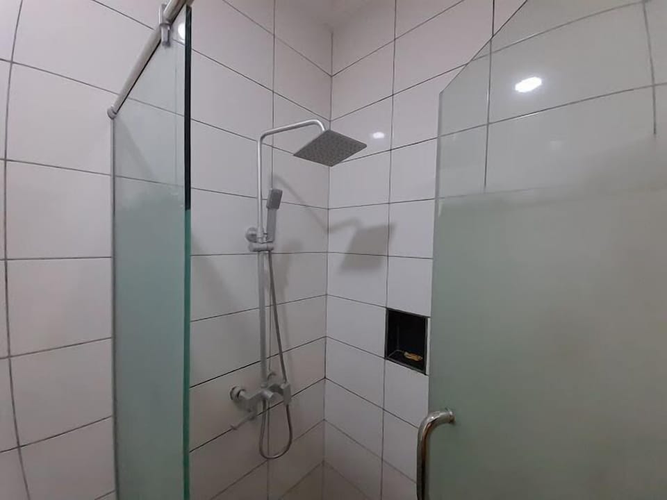 Family Room, Balcony, City View | Bathroom | Hair dryer, towels, soap, shampoo