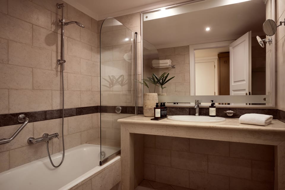 Double Room, Sea View | Bathroom | Free toiletries, hair dryer, bathrobes, slippers