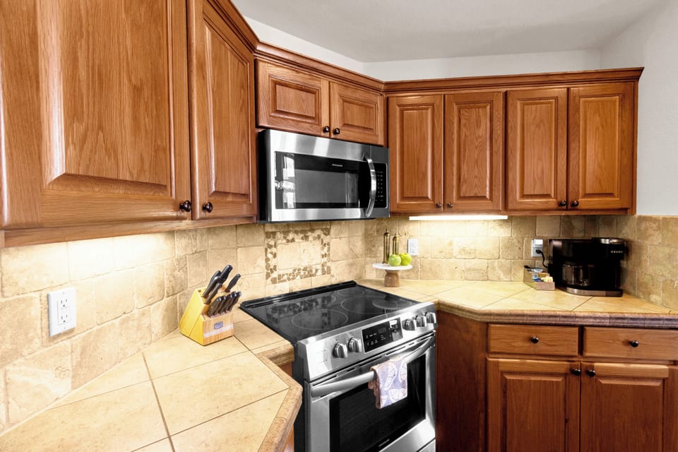 Open living, dining and kitchen area. Fully stocked kitchen. 