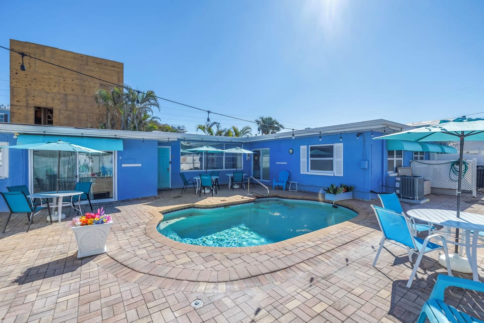 Sunbathe, swim, & savor the island life by the pool. We have gas grill & tables!