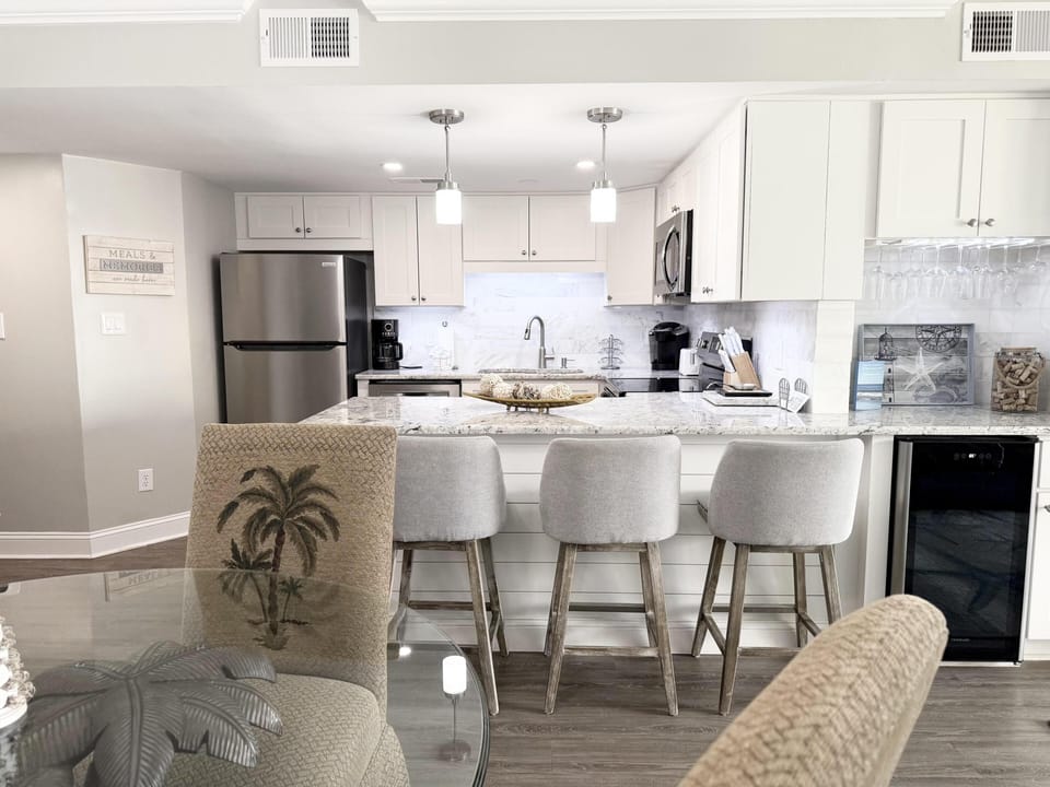 Bright, modern kitchen with spacious island seating for gatherings