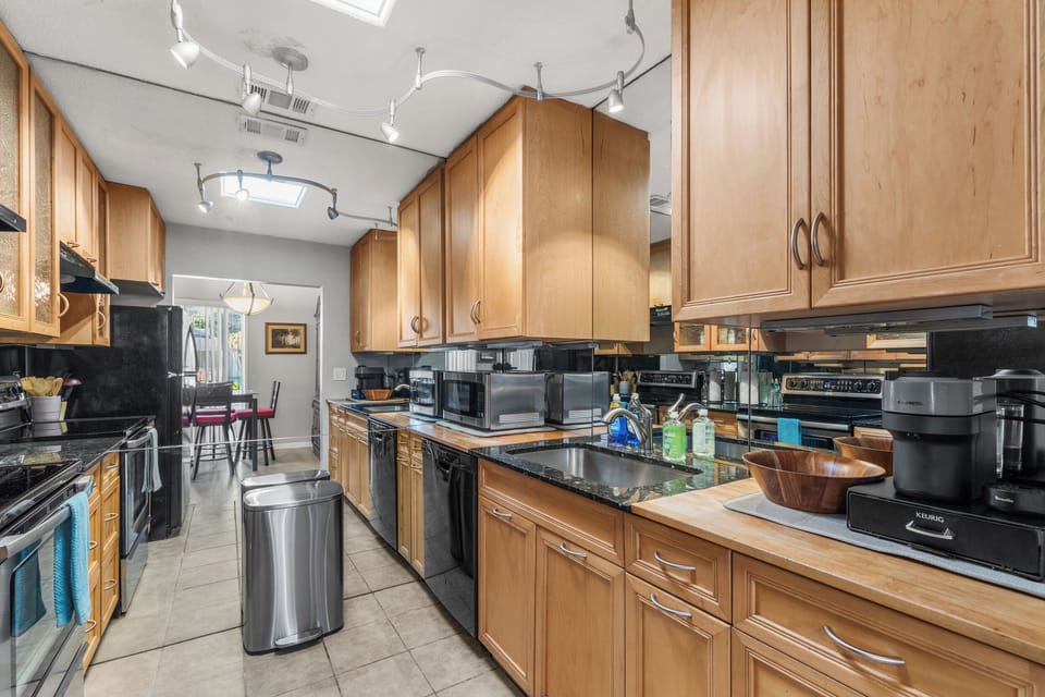 Latest kitchen appliances and dedicated coffee bar ready for your sunrise brews