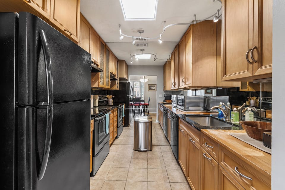 Fully stocked galley kitchen keeps meal prep simple after a day on Siesta Key