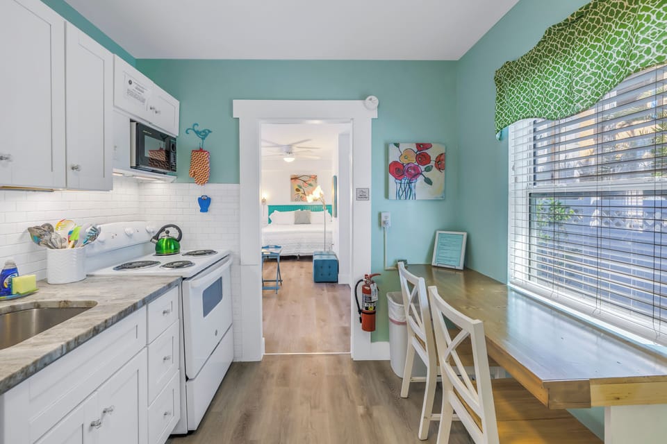 Coastal living made easy: cook, dine, and relax in this charming space.