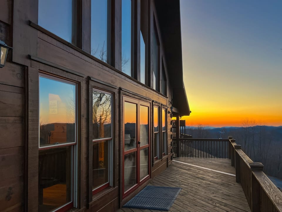 Mars Hill Haven at sunset, a spacious mountain cabin tucked high in the Scenic Wolf community near Hatley Pointe.