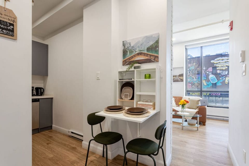 Cozy dining nook with built-in shelving, perfect for casual meals or morning coffee