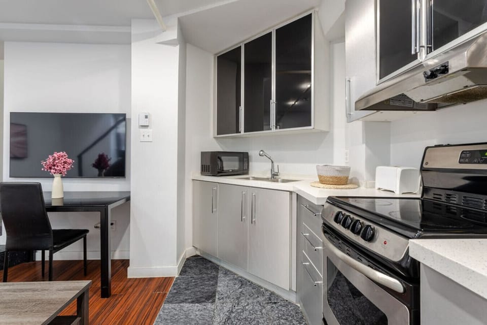 Fully equipped kitchen with modern essentials, perfect for effortless in-home dining
