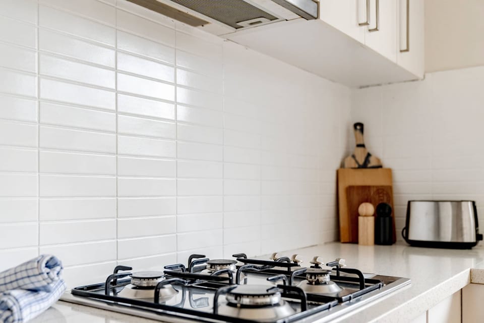 All the essentials for a chef's dream, from the gas cooktop, to an electric oven and dishwasher