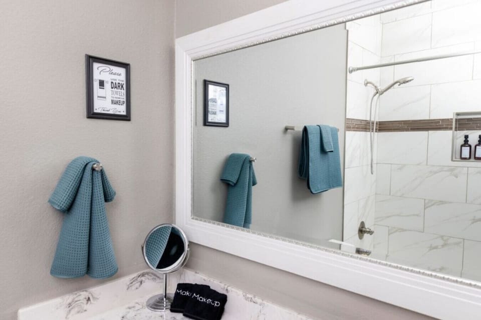 Nothing like a fresh towel and a perfect makeup mirror to kickstart your beauty routine. Who else loves our bathroom setup?
