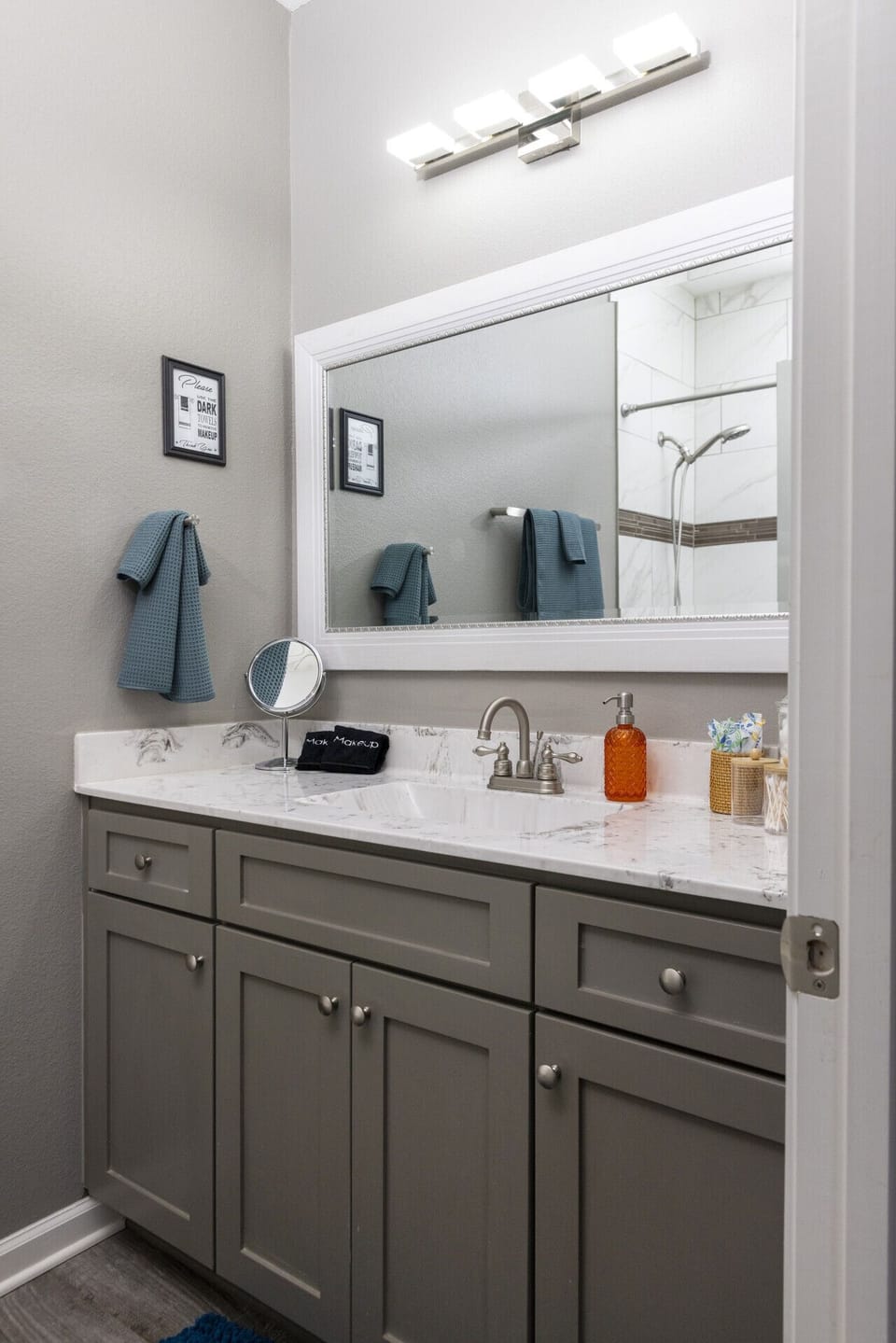This bathroom setup is all about simplicity and style with all the essentials to start and end your day.