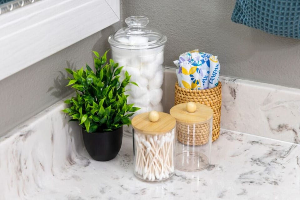 Keeping the bathroom counter organized and stylish with a trusty toothbrush, and a cute jar for all my essentials.