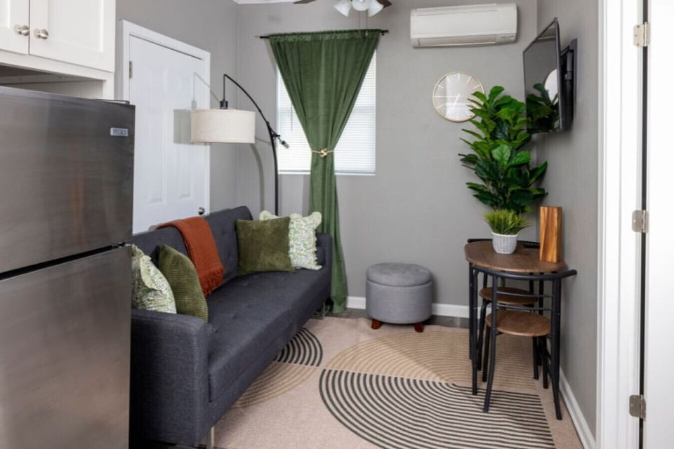Vibrant design meets relaxation, with plush seating and stylish decor—your retreat awaits!
