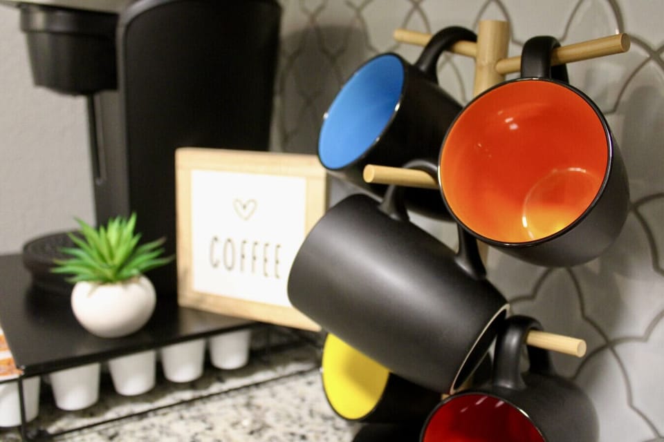 Coffee Corner: Savor your morning brew in style with vibrant mugs and a sleek coffee station!
