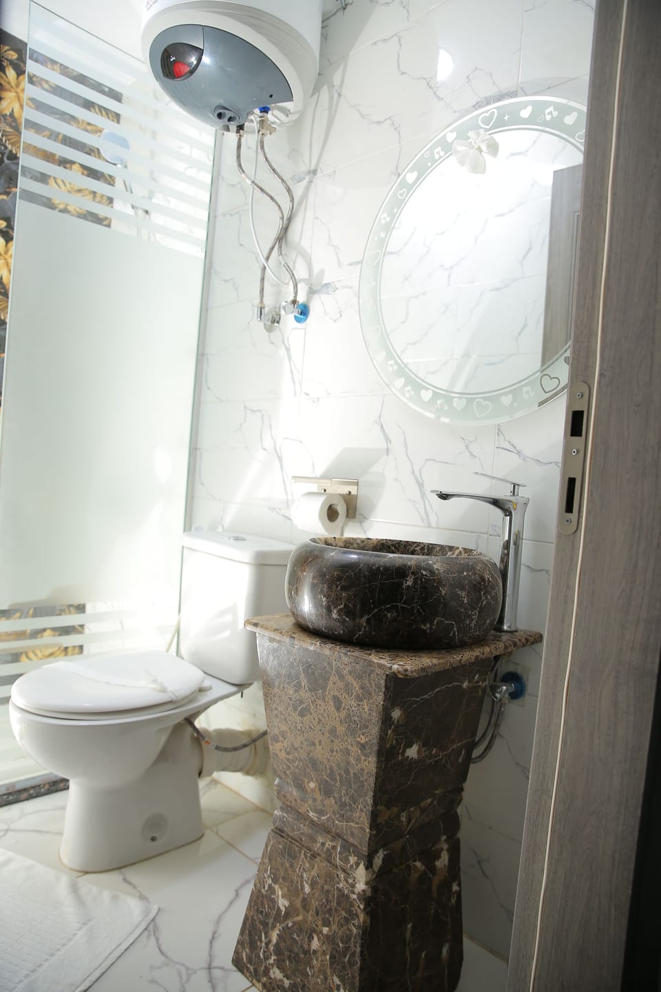 Separate tub and shower, slippers, bidet, towels