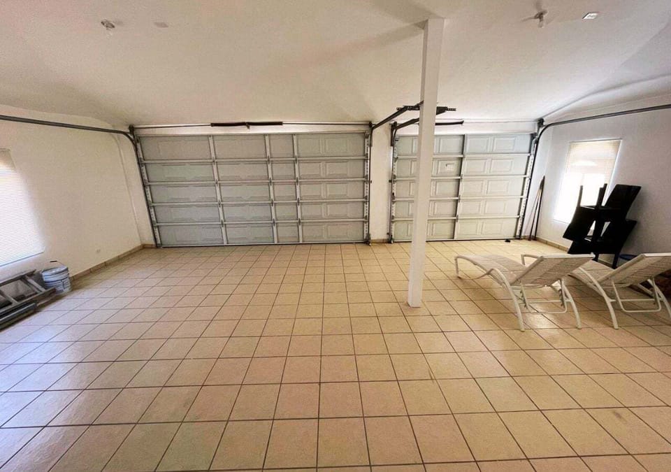 Garage available for guest use. Note: the garage motor currently does not work, so the door needs to be operated manually