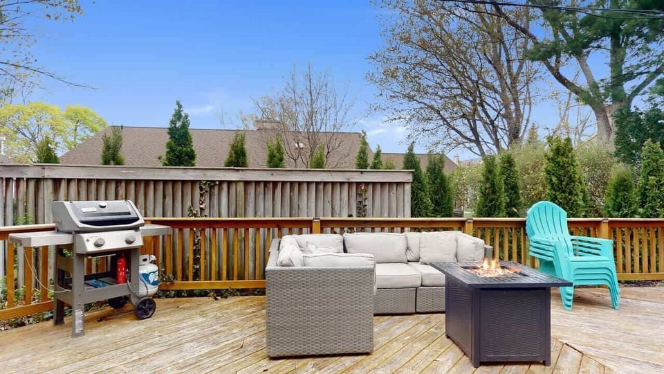 Backyard deck with fire table and grill