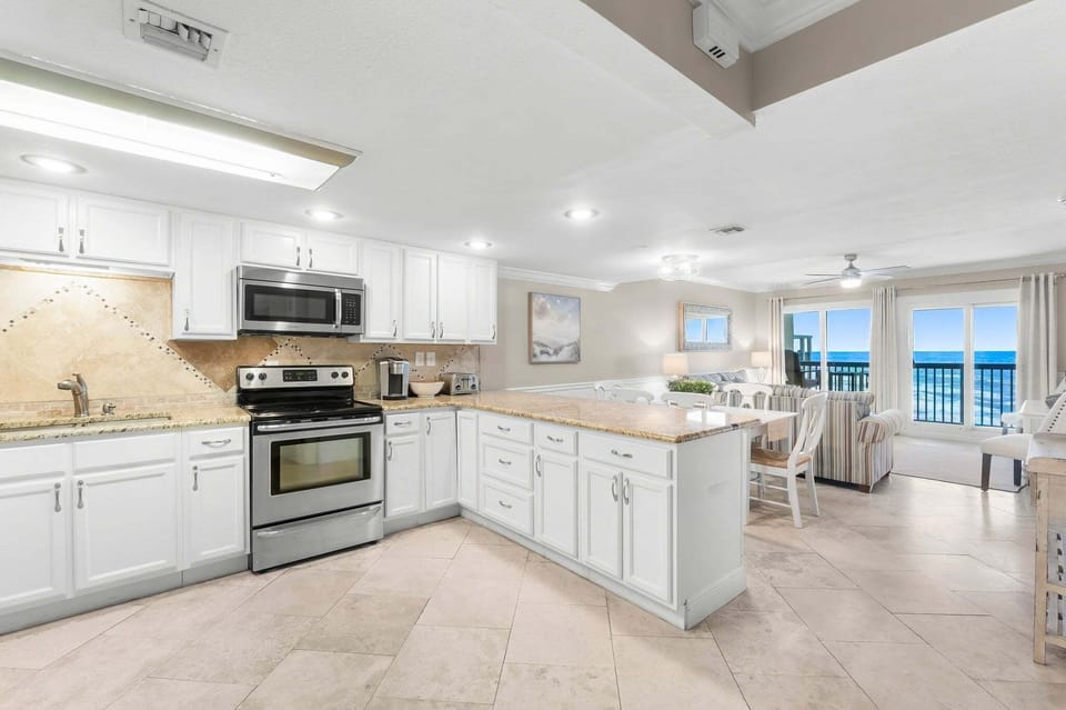 Cooking with a view in the open kitchen, dining and living room.