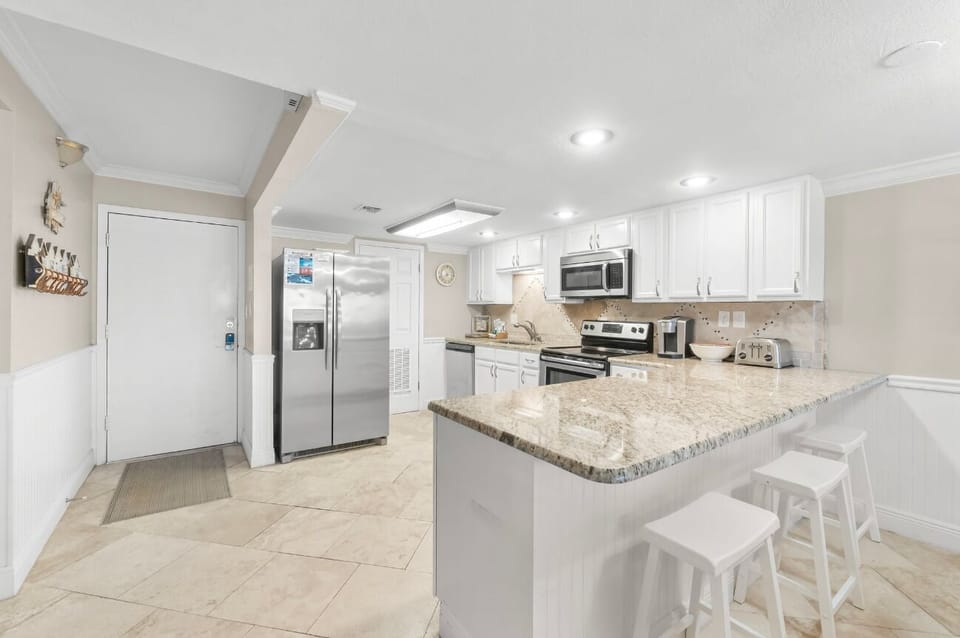The openness of the kitchen will allow everyone to pitch in and help make the meals.