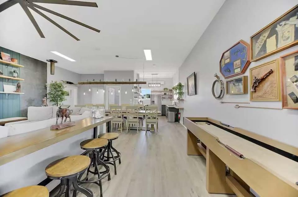 Relax and unwind in the cozy entertainment area, complete with comfy chairs for the perfect hangout spot!