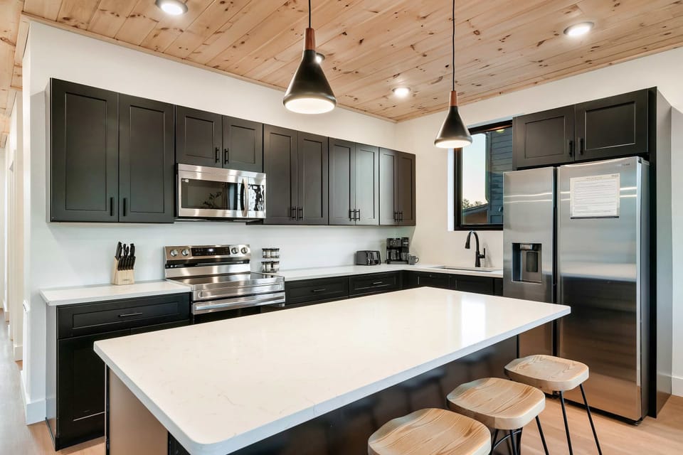 Cook up memories in this sleek space with modern appliances and ample counter space!