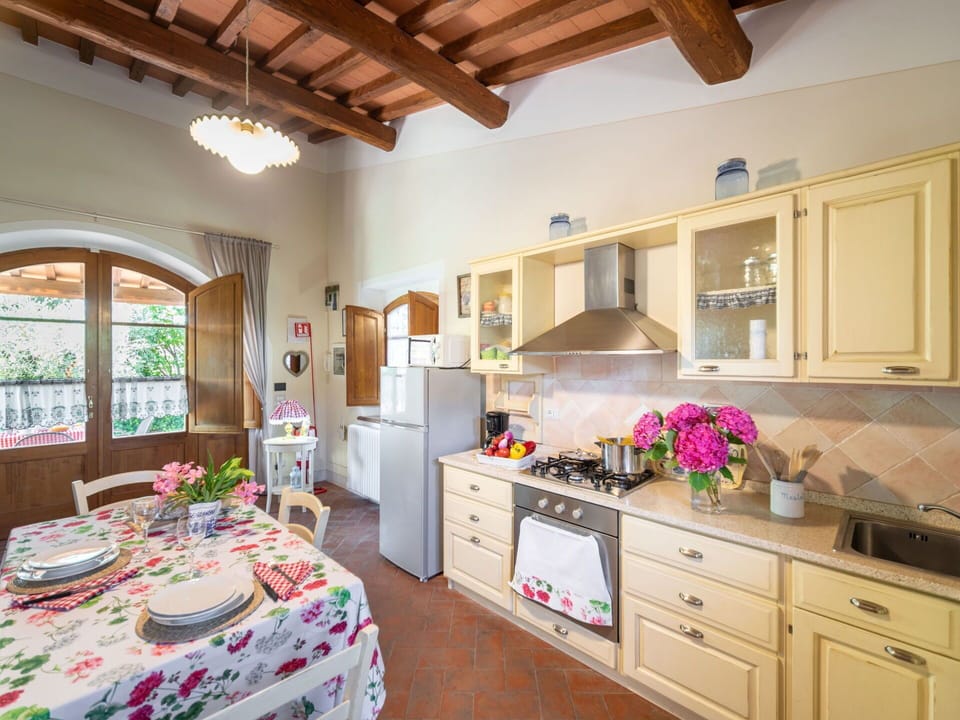 Furniture, Kitchen, Interior Design, Kitchen Appliance, Countertop, Wood, Flooring, Cabinetry, Ceiling, Table