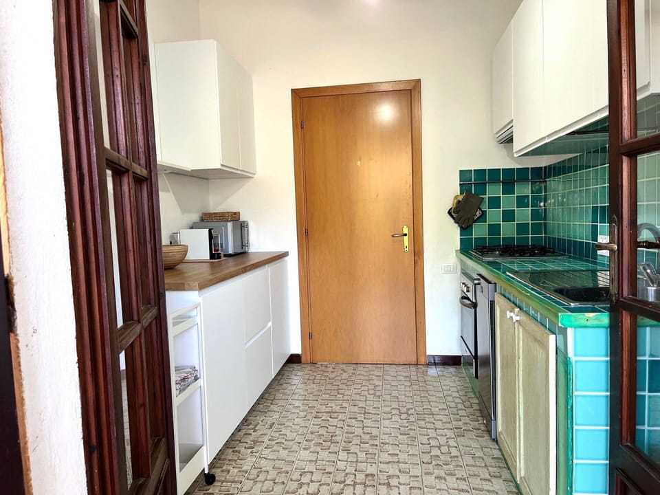 Kitchen, Interior Design, Flooring, Wood, Countertop, Floor, Major Appliance, Kitchen Appliance, Cabinetry, Lighting