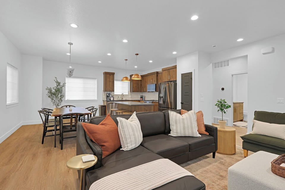 Open concept living, dining, and kitchen areas