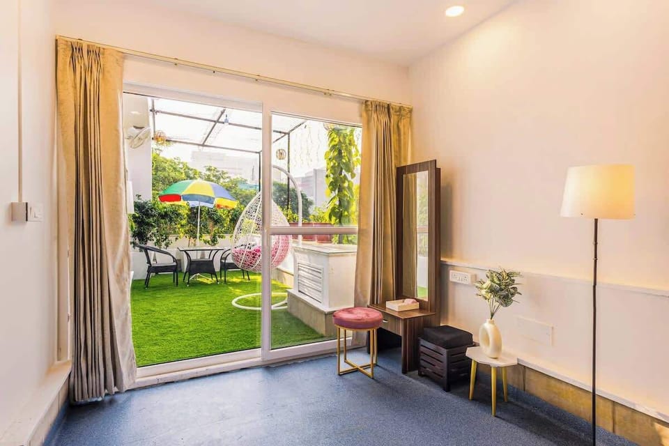 Large dressing area with bespoke cabinetry, full-length mirrors, and excellent lighting. Offers comfortable seats, abundant hanging space, and tidy shoe and accessory shelves. Perfect design and function for luxury dressing.