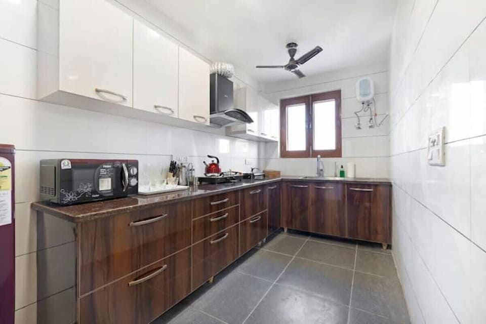 "Create culinary masterpieces in a space that inspires - where exquisite design and functionality meet, in the stunning and refined kitchen of your dreams."