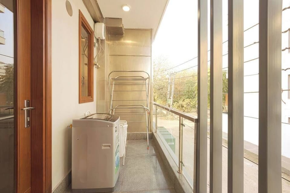 "Step outside and savor the beauty of the world around you - where breathtaking views and fresh air create a peaceful escape, in the serene haven of your balcony."