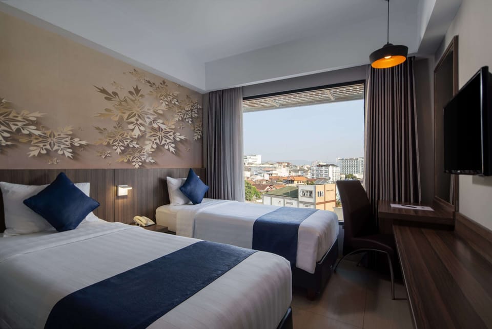 Deluxe Twin Room | Minibar, free WiFi, bed sheets