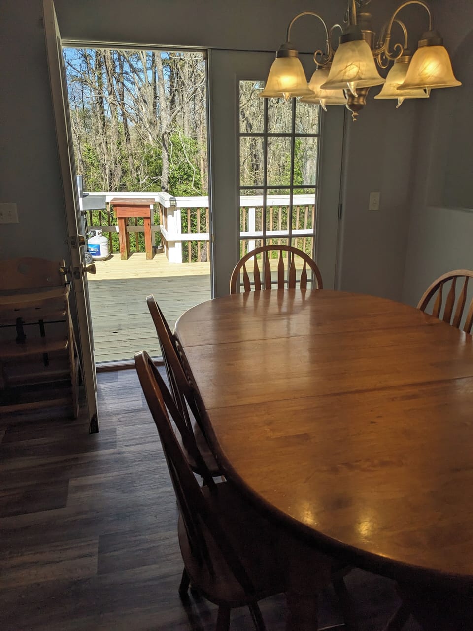 There is a deck off the dining room for relaxing and includes a grill to use.