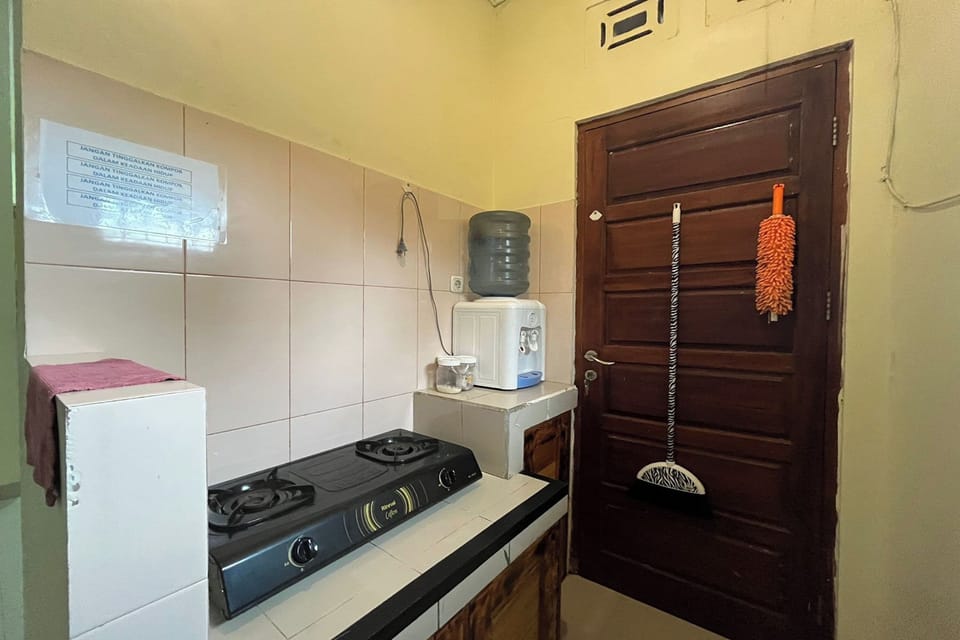 Villa | Private kitchen | Fridge, coffee/tea maker