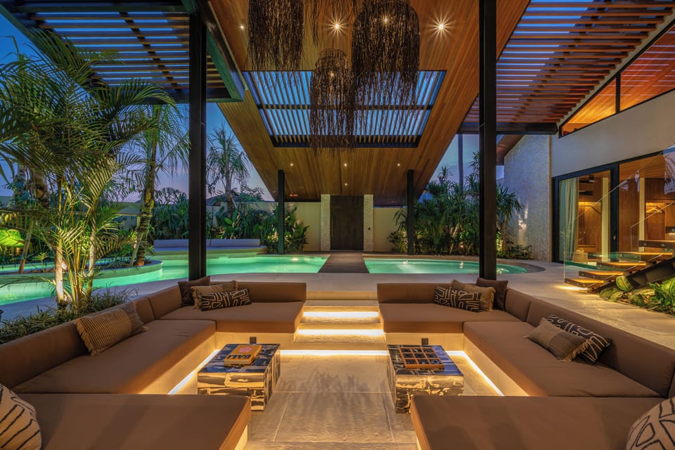 Deluxe Villa, Pool View | Living room | Flat-screen TV