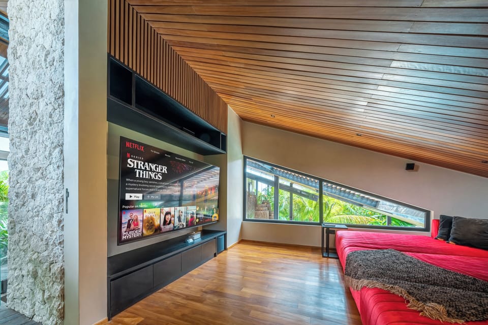 Deluxe Villa, Pool View | Living area | Flat-screen TV