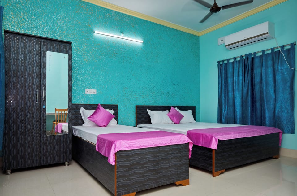 Deluxe Triple Room, Garden View | In-room safe, soundproofing, free WiFi