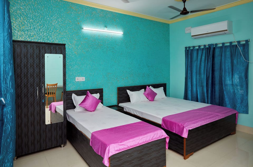 Deluxe Triple Room, Garden View | In-room safe, soundproofing, free WiFi